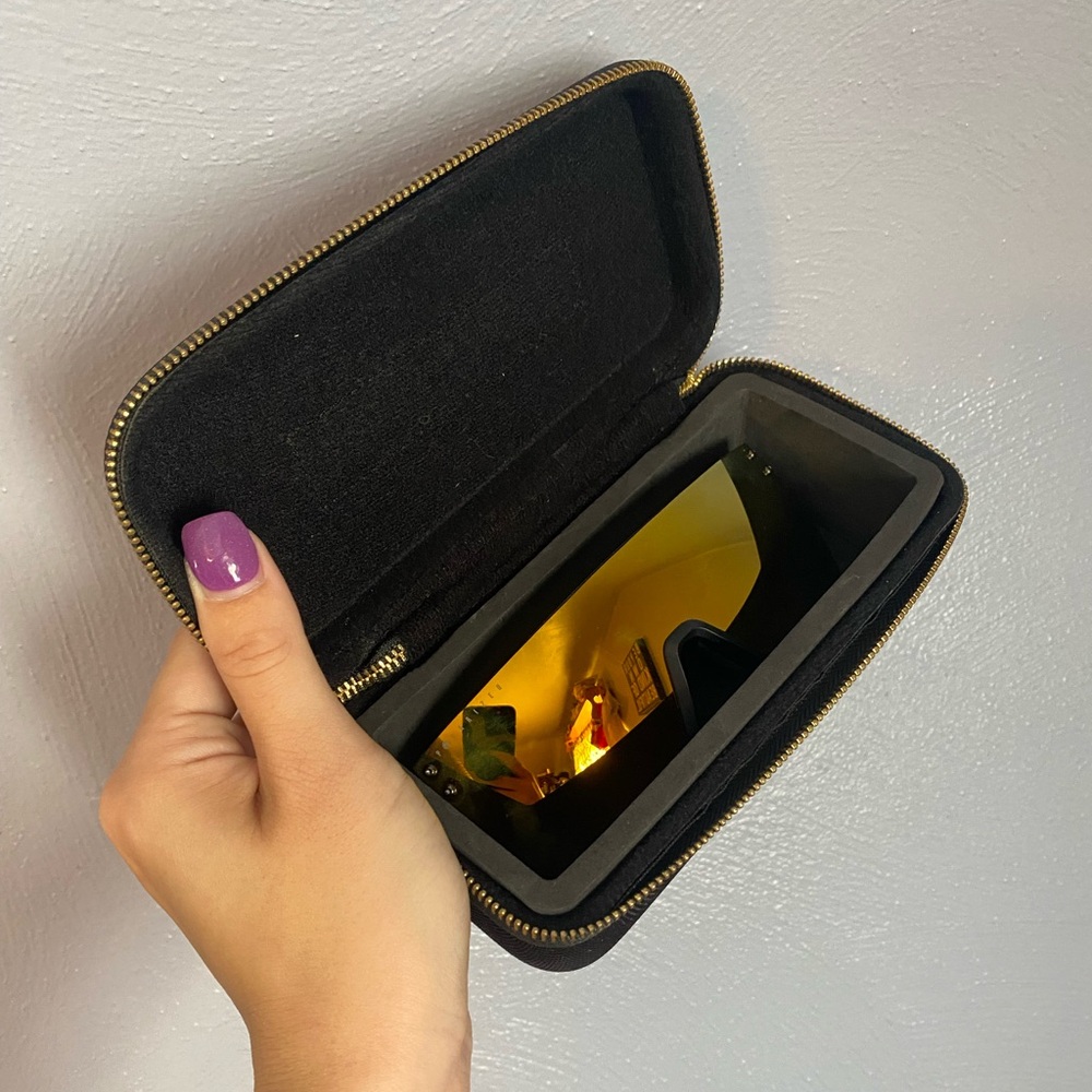 Yellow and black sunglasses + case